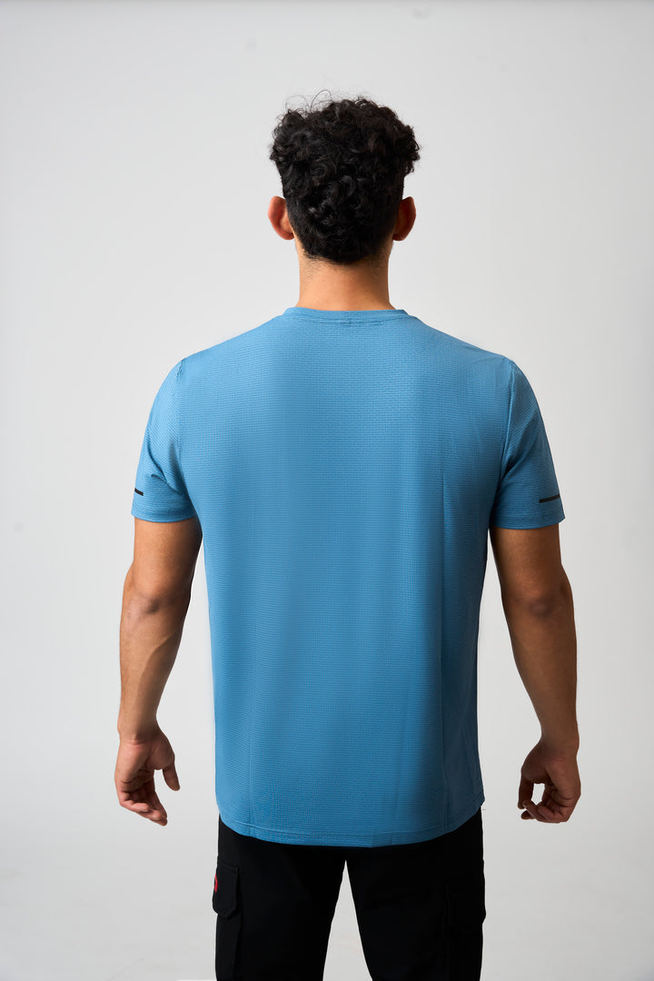 Model in Blue Performance Tee