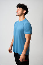 Load image into Gallery viewer, Model in Blue Performance Tee
