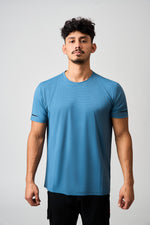 Load image into Gallery viewer, Model in Blue Performance Tee
