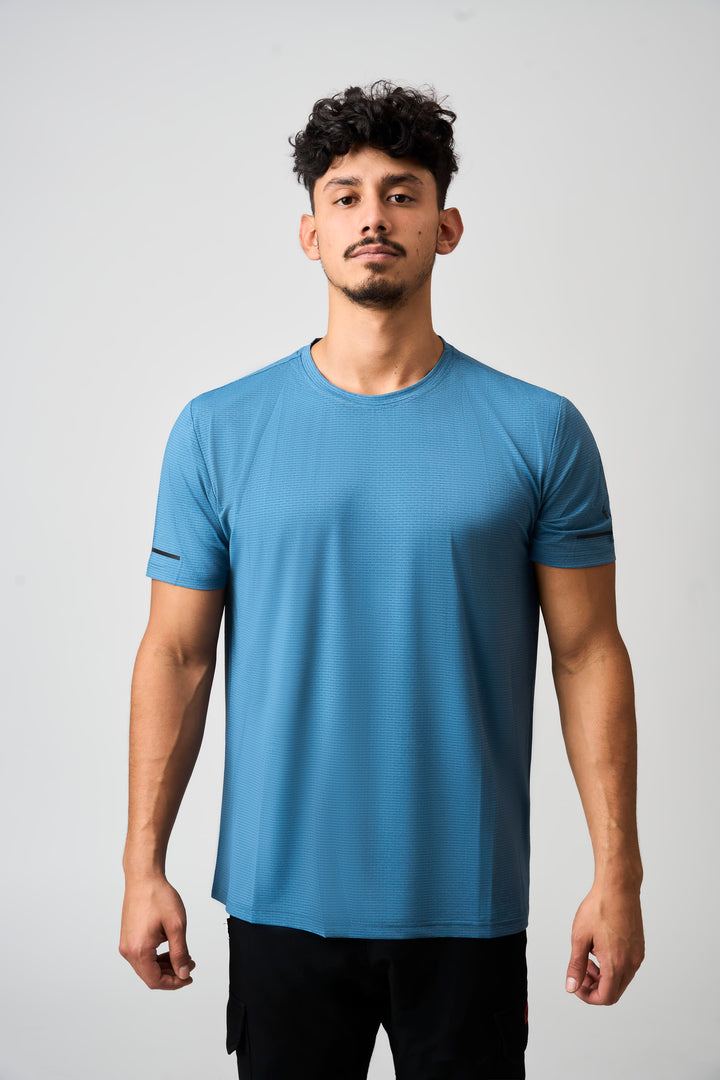 Model in Blue Performance Tee